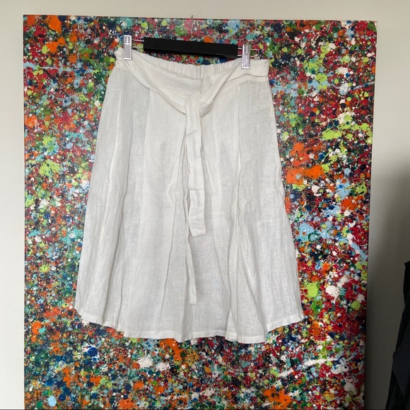 Designer light white linen skirt